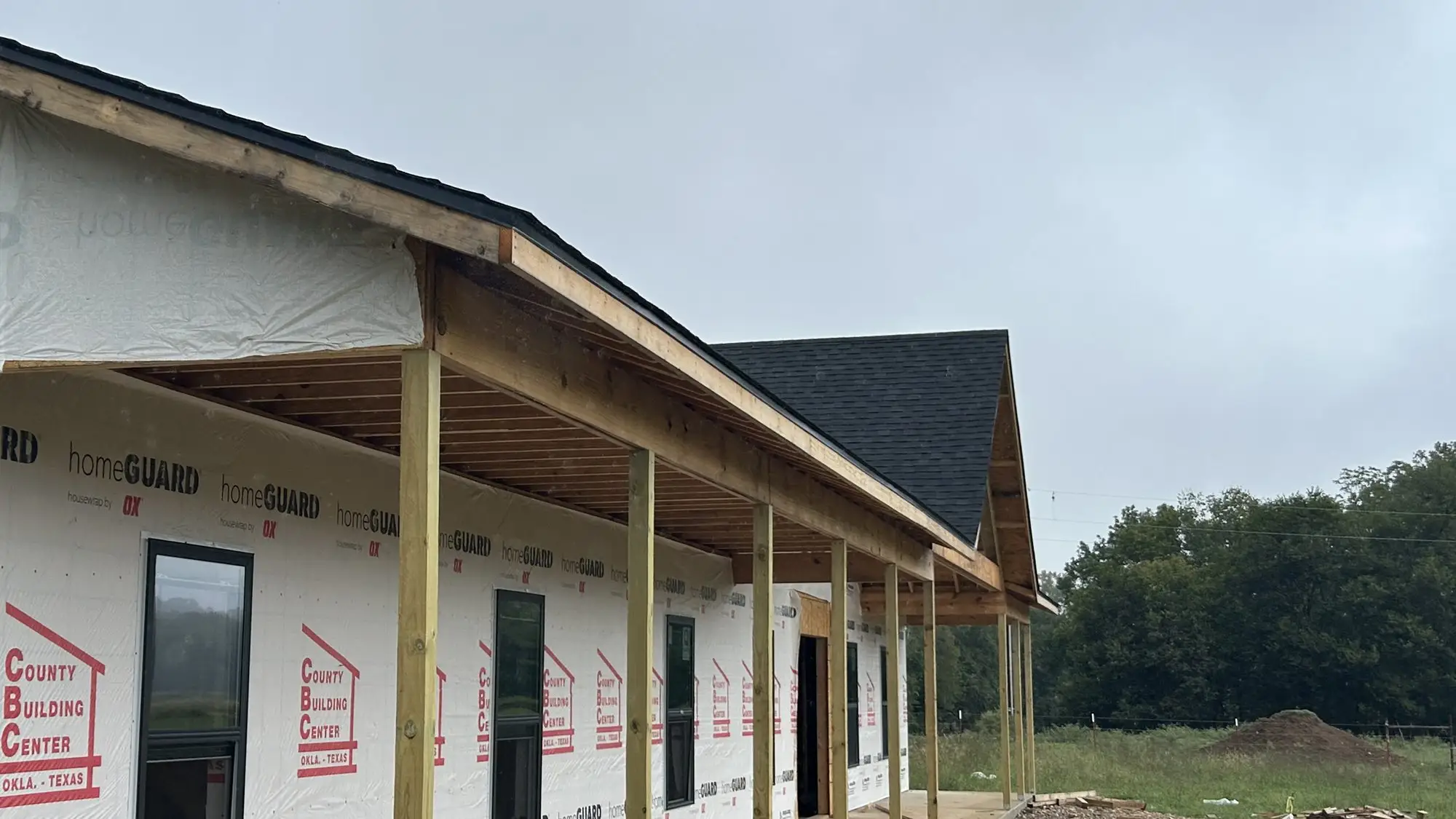 A commercial building under construction with the exterior going on