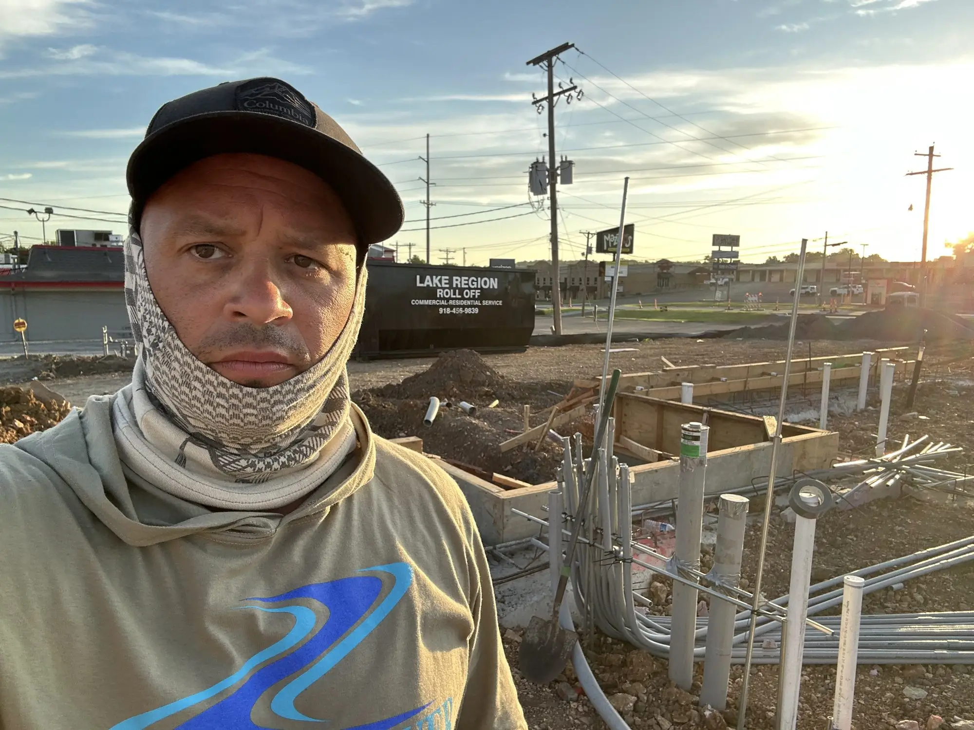 Brandon on a job site at the end of the day